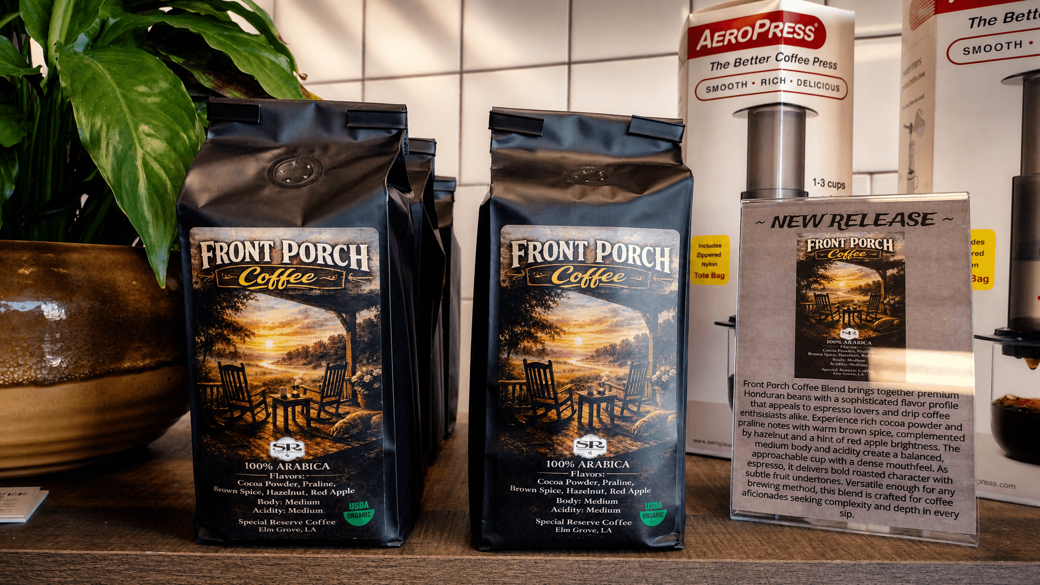 Close-up of custom coffee bags on a retail shelf